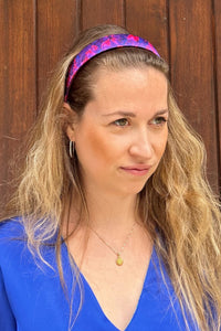 a violet and fuchsia silk printed headband that gives a of colour