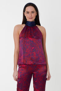 An Isabel Manns reversible halter neck silk satin top with tie collar in red marble print.