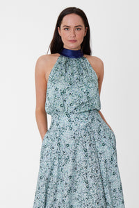 An Isabel Manns reversible halter neck silk satin top with tie collar in pale green print.