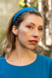 teal wool crepe headband on a model