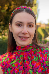 a small tulips printed headband with matching dress