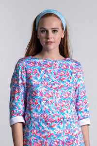 An Isabel Manns reversible tunic top with ¾ length sleeves in blue/pink dotted print.