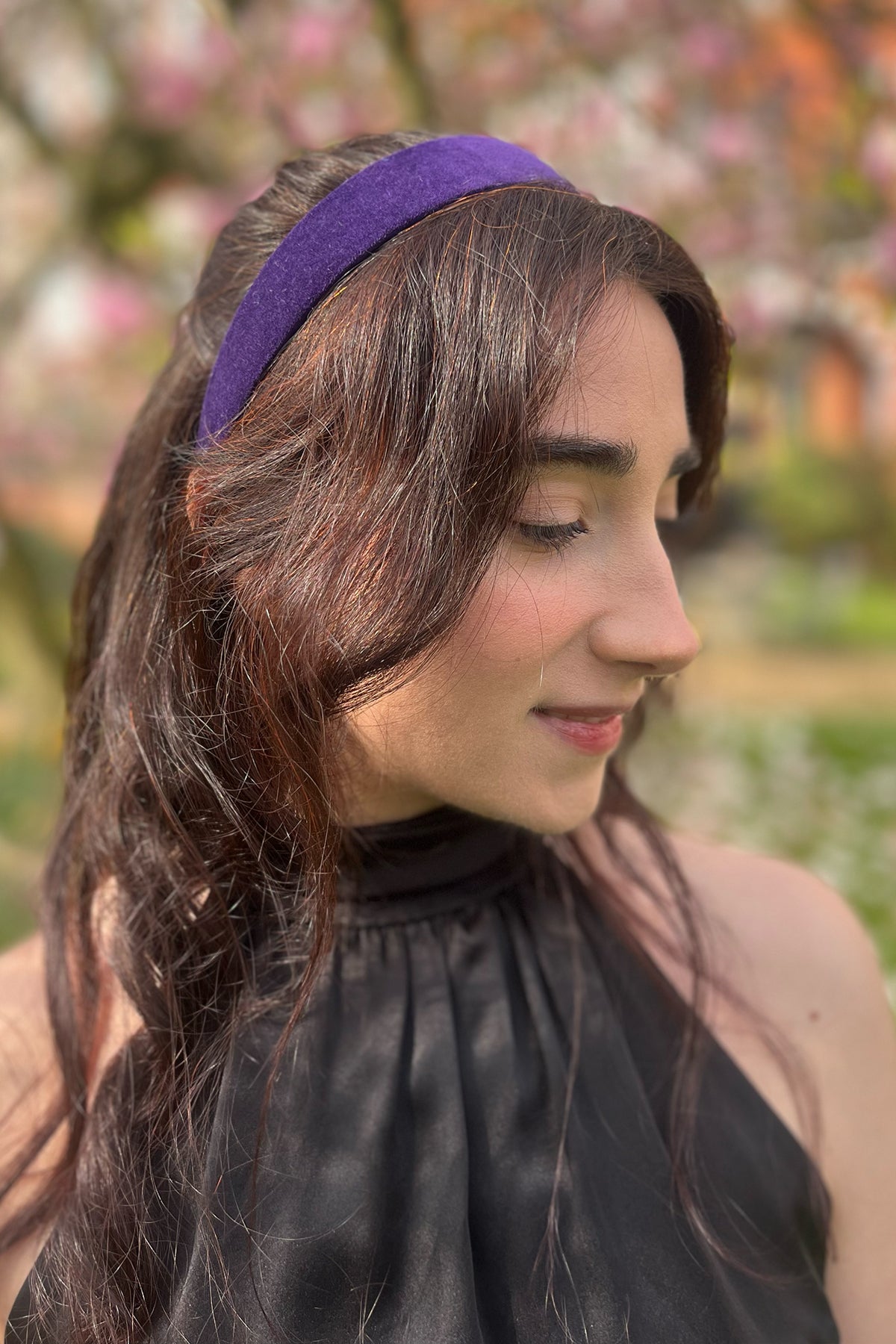 violet velvet small headband being worn by model