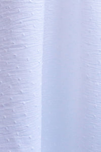 white dotted cotton swatch